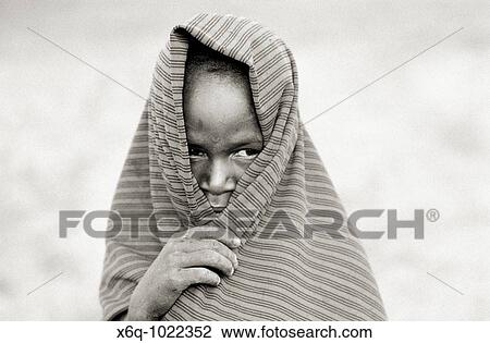 A young Masai child in Tanzania, Africa View Large Photo Image Stock Image - A young Masai child in Tanzania, Africa. Fotosearch