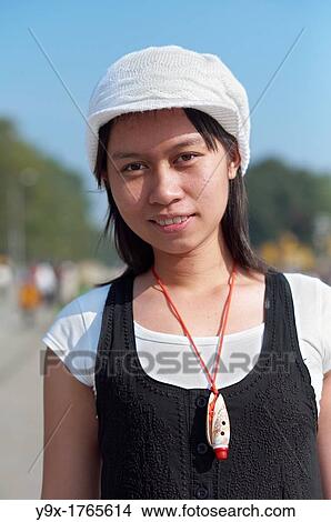 A young stylish woman posing in front of the Ho Chi Minh Mausoleum in Hanoi, Vietnam View Large Photo Image Picture - A young stylish woman posing in front of the Ho Chi Minh Mausoleum in Hanoi, Vietnam. Fotosearch