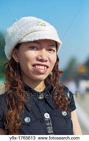 A young stylish woman posing in front of the Ho Chi Minh Mausoleum in Hanoi, Vietnam View Large Photo Image Stock Image - A young stylish woman posing in front of the Ho Chi Minh Mausoleum in Hanoi, Vietnam. Fotosearch
