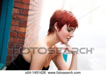 A young woman downtown in Spokane, Washington, USA View Large Photo Image Stock Photograph - A young woman downtown in Spokane, Washington, USA. Fotosearch