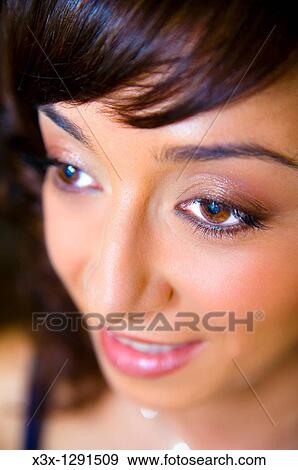 A young woman during make-up session View Large Photo Image Stock Photo - A young woman during make-up session. Fotosearch