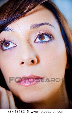 A young woman during make-up session View Large Photo Image Stock Photography - A young woman during make-up session. Fotosearch