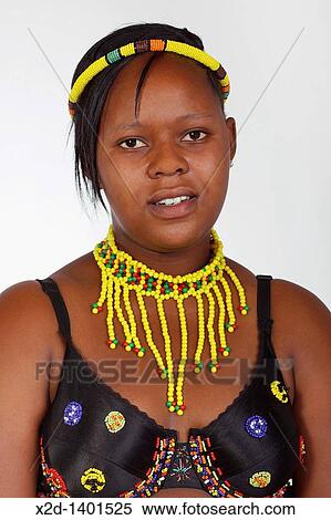 A young woman in traditional ceremonial Zulu dress South Africa Isolated View Large Photo Image Stock Photography - A young woman in traditional ceremonial Zulu dress South Africa Isolated. Fotosearch