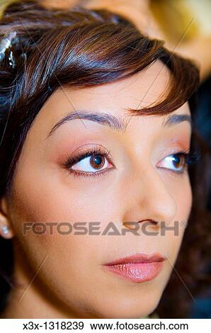 A young woman looking away View Large Photo Image Stock Photo - A young woman looking away. Fotosearch