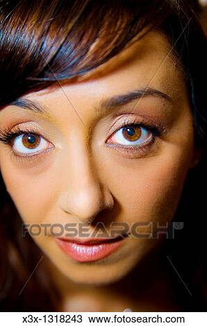 A young woman looking back View Large Photo Image Stock Image - A young woman looking back. Fotosearch