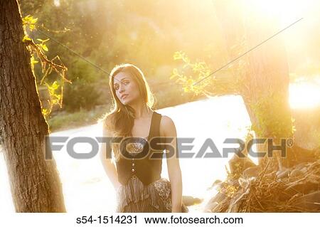 Stock Image - A young woman outdoors in Spokane, Washington, USA. Fotosearch