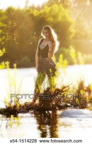 Stock Photo - A young woman outdoors in Spokane, Washington, USA. Fotosearch