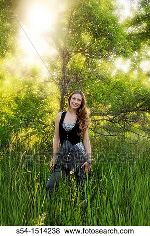 Stock Photo - A young woman outdoors in Spokane, Washington, USA. Fotosearch