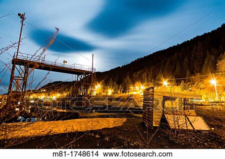 Picture - Abandoned, british columbia, canada, disused, industrial, night, sawmill, site, street lights, tahsis, vancouver island, horizontal. Fotosearch