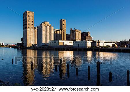 Abandoned grain elevator on Buffalo River in Buffalo New York. View Large Photo Image Stock Photo - Abandoned grain elevator on Buffalo River in Buffalo New York.. Fotosearch