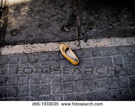 Abandoned shoe in the street, Valencia, Spain View Large Photo Image Stock Photography - Abandoned shoe in the street, Valencia, Spain. Fotosearch