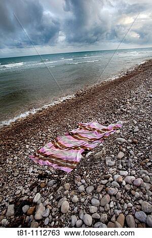 abandoned towel View Large Photo Image Stock Image - abandoned towel. Fotosearch