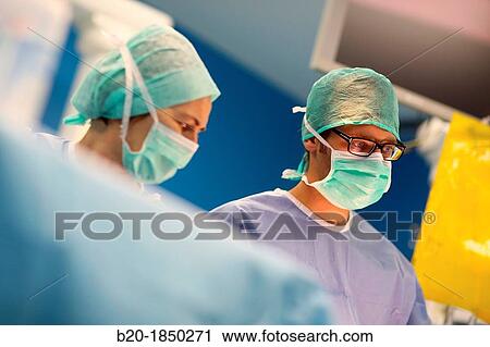 Stock Image - Abdominal Hernia Surgery, Surgeon, General Emergency Surgery, Operating Theatre, Donostia Hospital, San Sebastian, Donostia, Gipuzkoa, Basque Country, Spain. Fotosearch