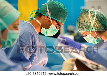 Stock Image - Abdominal Hernia Surgery, Surgeon, General Emergency Surgery, Operating Theatre, Donostia Hospital, San Sebastian, Donostia, Gipuzkoa, Basque Country, Spain. Fotosearch
