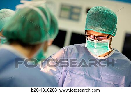 Stock Photo - Abdominal Hernia Surgery, Surgeon, General Emergency Surgery, Operating Theatre, Donostia Hospital, San Sebastian, Donostia, Gipuzkoa, Basque Country, Spain. Fotosearch