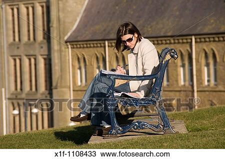 Aberystwyth university students reading outdoors on very warm day February 12 2008 View Large Photo Image Stock Image - Aberystwyth university students reading outdoors on very warm day February 12 2008. Fotosearch