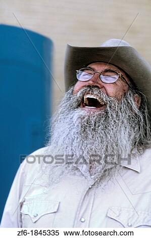 Abstract portrait of laughing cowboy with gray beard in Billings Montana View Large Photo Image Stock Photography - Abstract portrait of laughing cowboy with gray beard in Billings Montana. Fotosearch