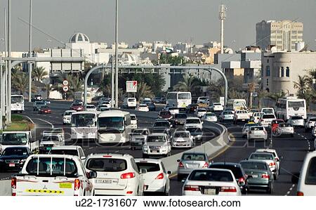 Abu Dhabi, United Arab Emirates: traffic along a road View Large Photo Image Stock Photo - Abu Dhabi, United Arab Emirates: traffic along a road. Fotosearch