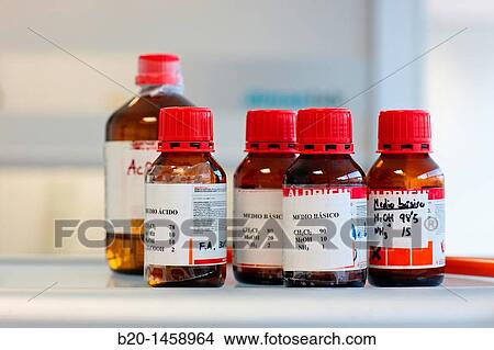 Picture - Acids and bases for thin layer chromatography (TLC) and column chromatography, synthesis lab, IkerChem research lab, design and synthesis of new chemical entities with therapeutic applications in oncology. Fotosearch