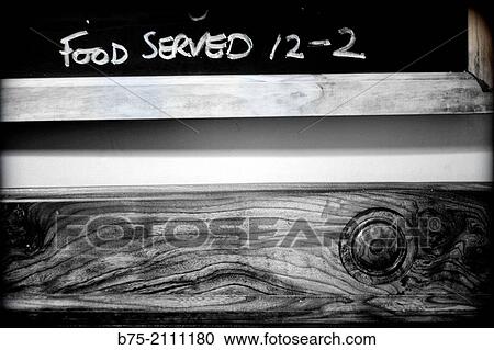 Stock Image - Ad of food served from 12 to 2. Yorkshire Dales, England, UK, Europe. Fotosearch