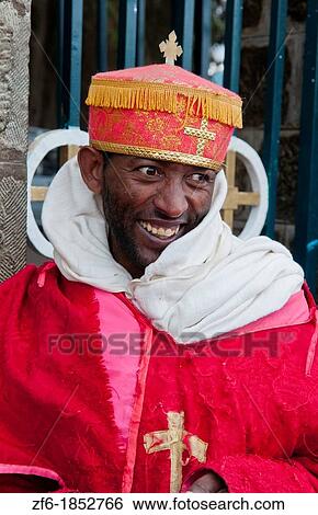 Addis Ababa Ethiopia Africa religious priest in red robe at Church of St Mary with crosses and religion 1 View Large Photo Image Stock Photograph - Addis Ababa Ethiopia Africa religious priest in red robe at Church of St Mary with crosses and religion 1. Fotosearch