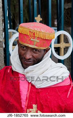 Addis Ababa Ethiopia Africa religious priest in red robe at Church of St Mary with crosses and religion 1 View Large Photo Image Stock Photography - Addis Ababa Ethiopia Africa religious priest in red robe at Church of St Mary with crosses and religion 1. Fotosearch