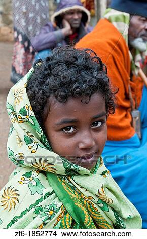 Addis Ababa Ethiopia Africa young Indian dark girl age 6 portrait in green in Shero Meda area 2 View Large Photo Image Picture - Addis Ababa Ethiopia Africa young Indian dark girl age 6 portrait in green in Shero Meda area 2. Fotosearch