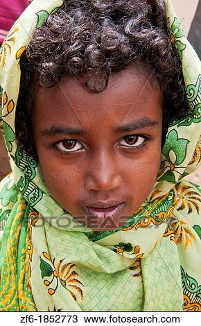 Addis Ababa Ethiopia Africa young Indian dark girl age 6 portrait in green in Shero Meda area 2 View Large Photo Image Stock Image - Addis Ababa Ethiopia Africa young Indian dark girl age 6 portrait in green in Shero Meda area 2. Fotosearch