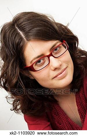 adorable 20-25 year old student with red glasses View Large Photo Image Stock Image - adorable 20-25 year old student with red glasses. Fotosearch