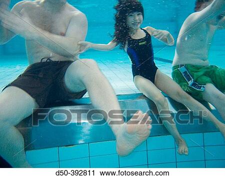 Adult and children in pool View Large Photo Image Stock Image - Adult and children in pool. Fotosearch