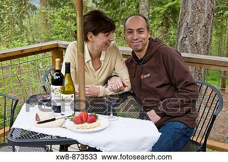 Adult couple having fun wine tasting View Large Photo Image Stock Image - Adult couple having fun wine tasting. Fotosearch