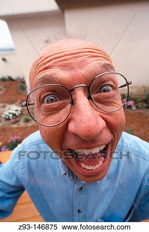 Adult man making funny face View Large Photo Image Stock Photography - Adult man making funny face. Fotosearch