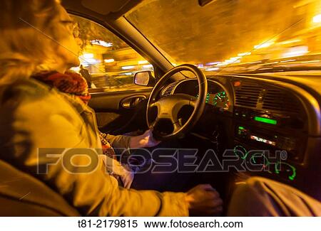 Adult woman driving through Barcelona, Spain View Large Photo Image Stock Photography - Adult woman driving through Barcelona, Spain. Fotosearch