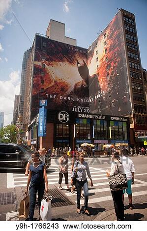 Stock Image - Advertising for the latest Batman film,? The Dark Knight Rises? is seen in Times Square in New York. Fotosearch