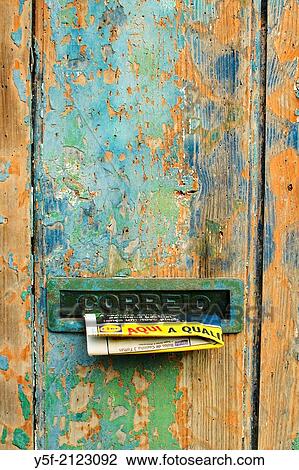 Advertising panflet on a mailbox of Alfama house. View Large Photo Image Stock Image - Advertising panflet on a mailbox of Alfama house.. Fotosearch