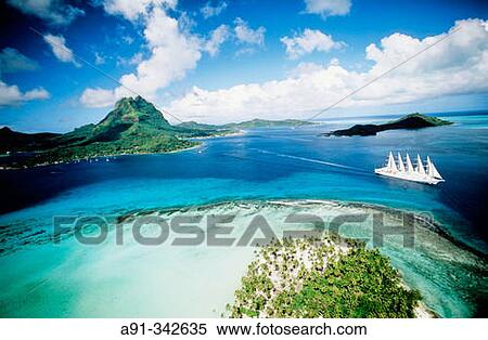 Aerial of Bora-Bora lagoon in the Leeward islands. Society archipelago. French Polynesia View Large Photo Image Stock Photography - Aerial of Bora-Bora lagoon in the Leeward islands. Society archipelago. French Polynesia. Fotosearch