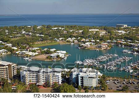 Aerial of waterside apartments and houses around Cullen Bay Marina View Large Photo Image Picture - Aerial of waterside apartments and houses around Cullen Bay Marina. Fotosearch