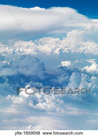 Aerial shots of clouds and airplanes View Large Photo Image Stock Photo - Aerial shots of clouds and airplanes. Fotosearch