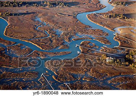 Stock Photo - Aerial showing marsh front residences on Kiawah Island, South Carolina. Fotosearch