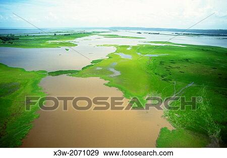 aerial view, confluence of amazonas river and tapajos river, santarem, state of para, amazon region, brazil, south america. View Large Photo Image Stock Photo - aerial view, confluence of amazonas river and tapajos river, santarem, state of para, amazon region, brazil, south america.. Fotosearch