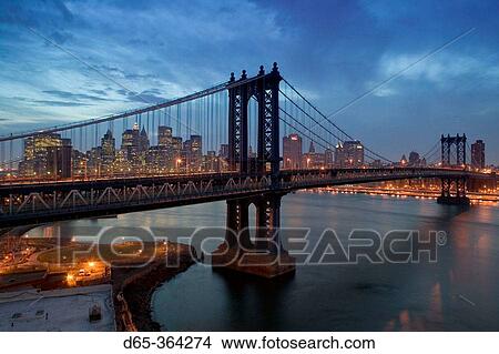 Aerial view from Brooklyn at dusk. Manhattan and Brooklyn bridges and Lower Manhattan. New York city. USA. View Large Photo Image Picture - Aerial view from Brooklyn at dusk. Manhattan and Brooklyn bridges and Lower Manhattan. New York city. USA.. Fotosearch