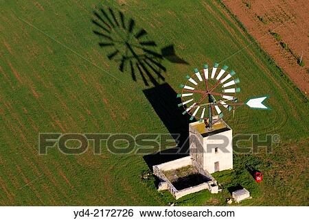 Stock Photograph - Aerial View of a Windmill of Mallorca, Balearic Island, Spain.. Fotosearch