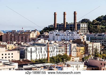 Aerial view of Barcelona downtown, Catalonia, Spain? Tres Xemeneies? former industrial complex now FECSA-ENDESA electric company office building, Barcelona Catalonia, Spain View Large Photo Image Stock Photography - Aerial view of Barcelona downtown, Catalonia, Spain? Tres Xemeneies? former industrial complex now FECSA-ENDESA electric company office building, Barcelona Catalonia, Spain. Fotosearch