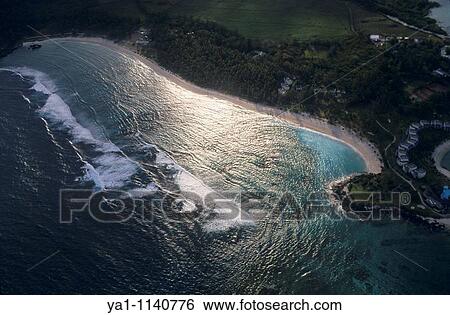 Aerial view of Blue Bay beach at evening. Mauritius Island. Indian Ocean View Large Photo Image Stock Photograph - Aerial view of Blue Bay beach at evening. Mauritius Island. Indian Ocean. Fotosearch
