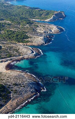Aerial view of Cala Torta, Cala Mitjana, Cala Estreta and Cala es Matzoc, North Island, Mallorca, Balearic Island, Spain. View Large Photo Image Stock Image - Aerial view of Cala Torta, Cala Mitjana, Cala Estreta and Cala es Matzoc, North Island, Mallorca, Balearic Island, Spain.. Fotosearch