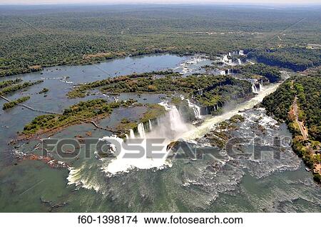 Picture - Aerial view of Iguassu Falls, Iguassu river, border between Brazil and Argentina.. Fotosearch