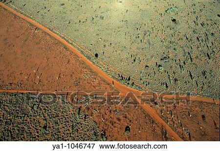 Aerial view of junction tracks near Ayers Rock, Uluru Kata Tjuta National park, Northern Territory, Australia View Large Photo Image Stock Photo - Aerial view of junction tracks near Ayers Rock, Uluru Kata Tjuta National park, Northern Territory, Australia. Fotosearch