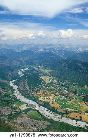 Aerial view of La Bleone valley near Le Brusquet, back mountains of Mercantour National park, Alpes de Haute Provence, France View Large Photo Image Stock Photo - Aerial view of La Bleone valley near Le Brusquet, back mountains of Mercantour National park, Alpes de Haute Provence, France. Fotosearch
