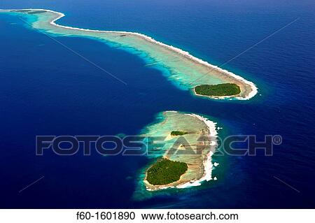 Aerial view of Micronesian atoll near Chuuk, Federated States of Micronesia, North Pacific. View Large Photo Image Stock Image - Aerial view of Micronesian atoll near Chuuk, Federated States of Micronesia, North Pacific.. Fotosearch
