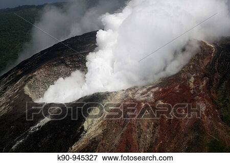 Aerial view of Mount Garet volcano with hot steam in his crater, Gaua, Banks Islands, Vanuatu, Melanesia, South Pacific View Large Photo Image Stock Photo - Aerial view of Mount Garet volcano with hot steam in his crater, Gaua, Banks Islands, Vanuatu, Melanesia, South Pacific. Fotosearch
